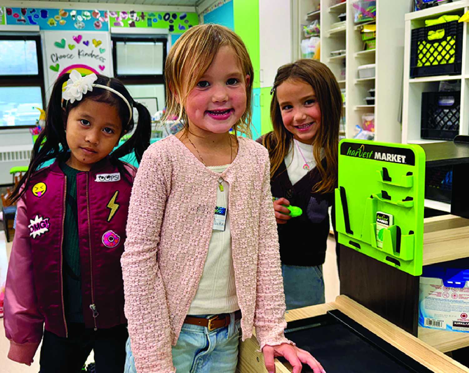 MacLeod School in Moosomin has the largest Kindergarten enrolment in years, and has had to add a third Kindergarten class, hire an additional teacher, and convert a multi-use space to a classroom because of the higher numbers. From left are Kindergarten students Zoe, Navy, and Mila